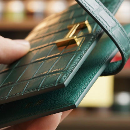 Green wallet with zip coin compartment